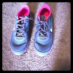 Pink and gray Nike’s size 9